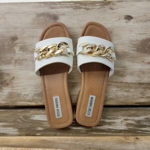 Steve Madden Woody 10M small heeled slides with goldtone chain accents. SEE MORE